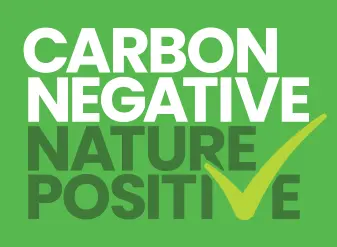 Logo for Carbon Negative Nature Positive - white and dark green writing on a light green background with a yellow tick. 